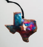 Copper Texas-shaped pendant with a star on a white background
