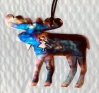 Colorful moose-shaped ornament on a textured white background
